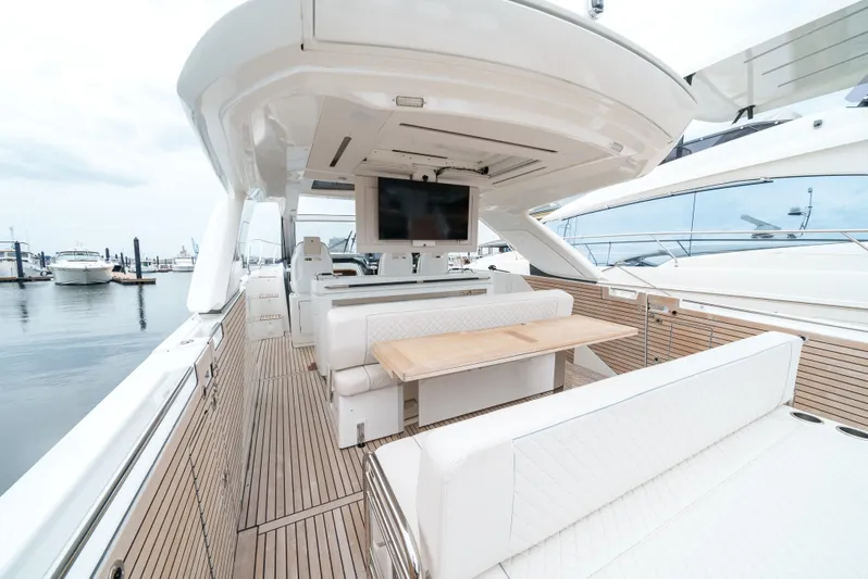 Yacht Photos Pics 2024 Jeanneau DB43 Outboard yacht with sleek deck and luxurious seating.