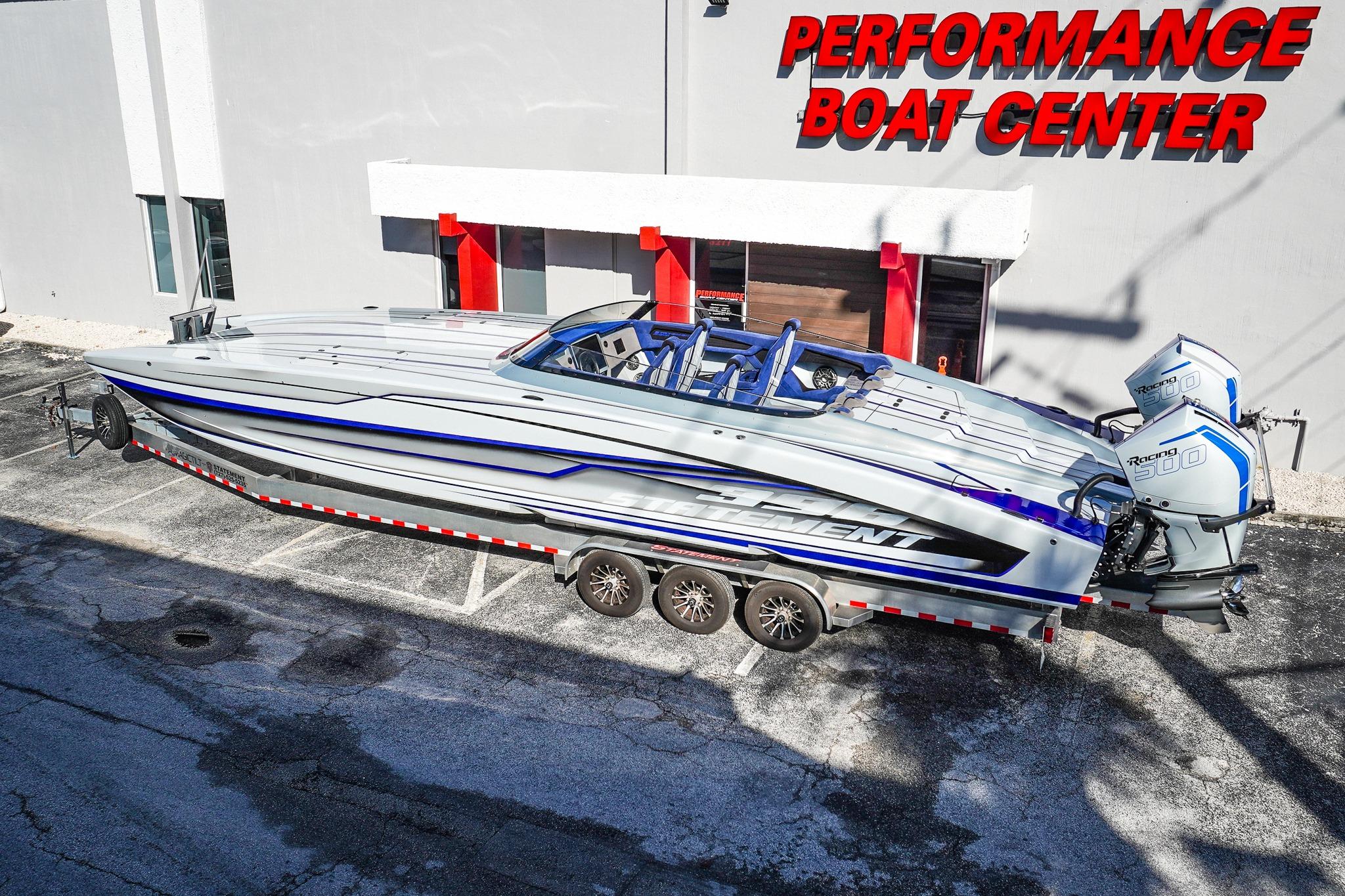 High-performance Statement 396 boat at Performance Boat Center, featuring sleek design and powerful engines.