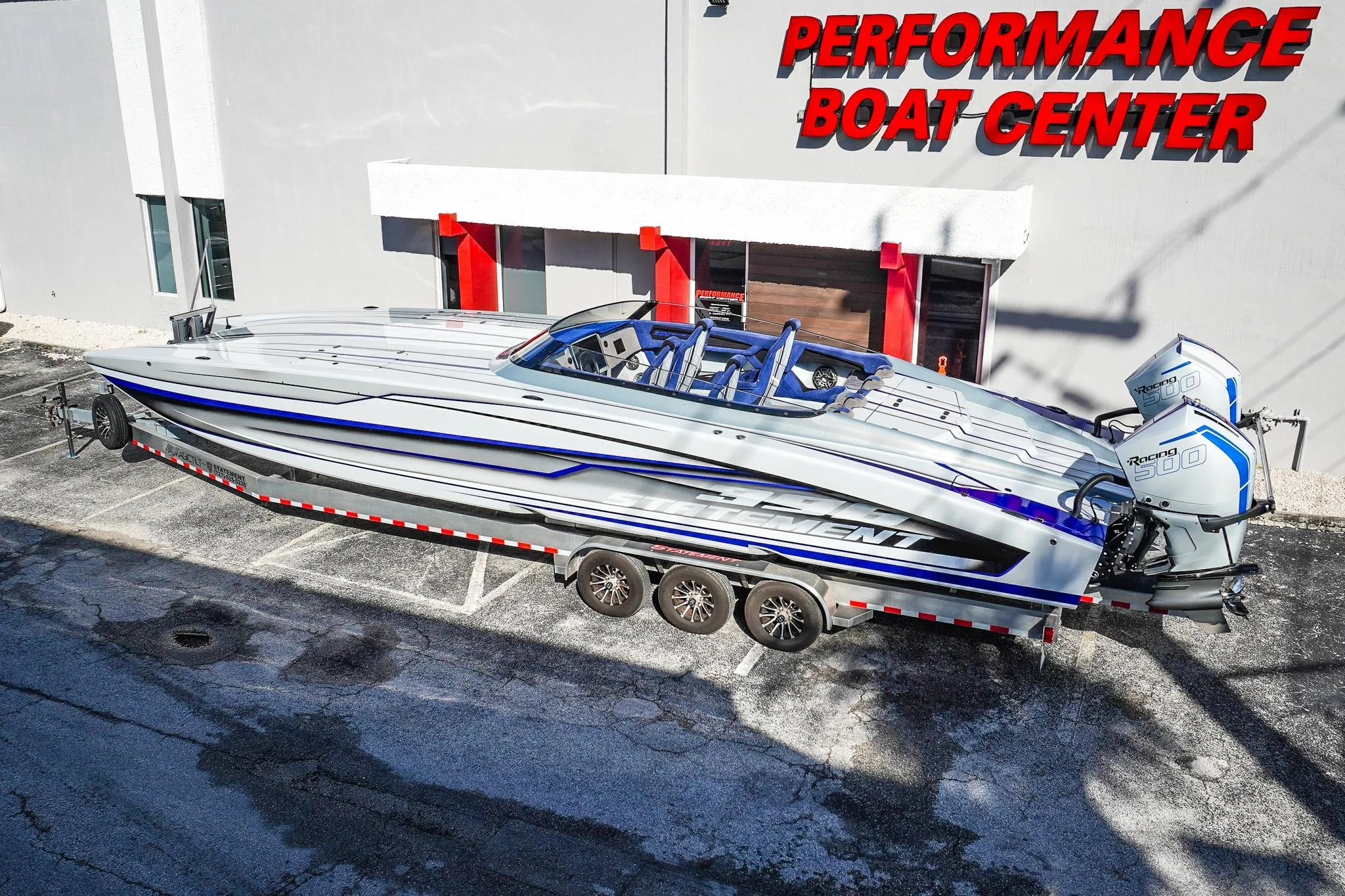 High-performance Statement 396 boat at Performance Boat Center, featuring sleek design and powerful engines.