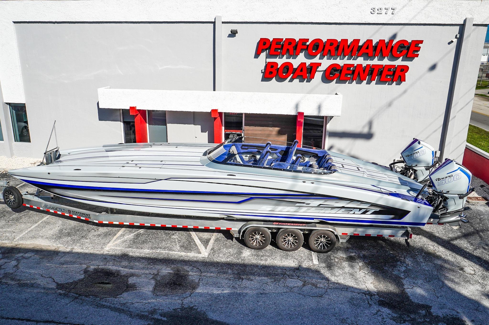 2026 Statement 396 powerboat at Performance Boat Center, featuring sleek design and powerful engines.