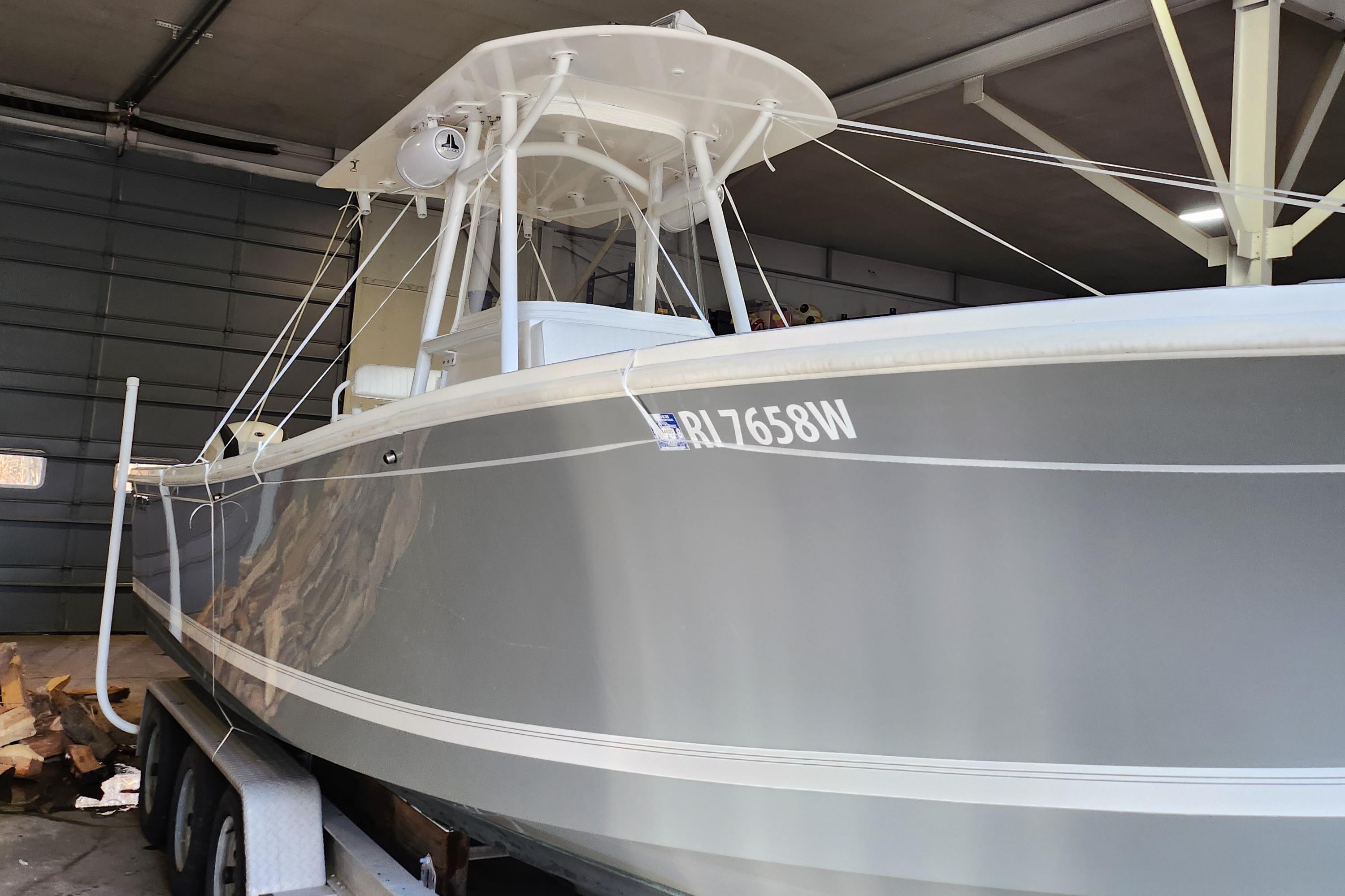 Fishing Rod holder mounted in the engine compartment - Maxum Boat