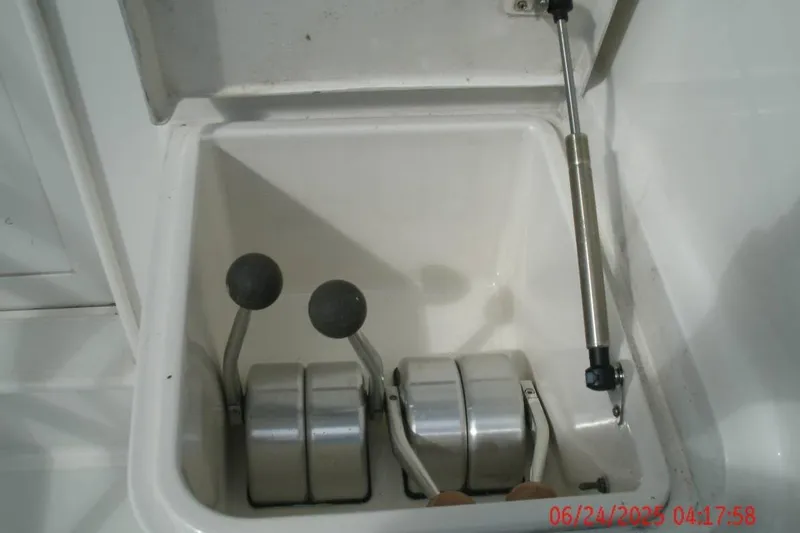 Yacht Photos Pics Control levers in a 1998 Ocean Yachts 48 Super Sport boat compartment.