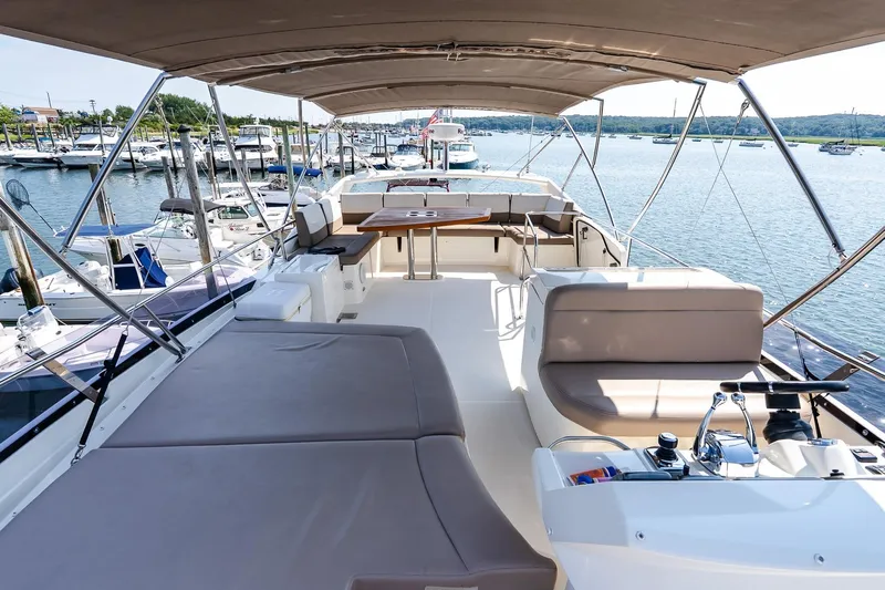 Passion Play Yacht Photos Pics 2014 Prestige Yachts 550 Flybridge, spacious deck view at marina.