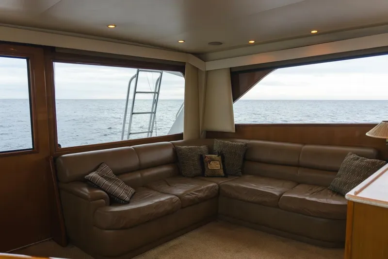 Happy Ending Yacht Photos Pics Luxurious interior of 2000 Viking 55 Convertible yacht with ocean view.