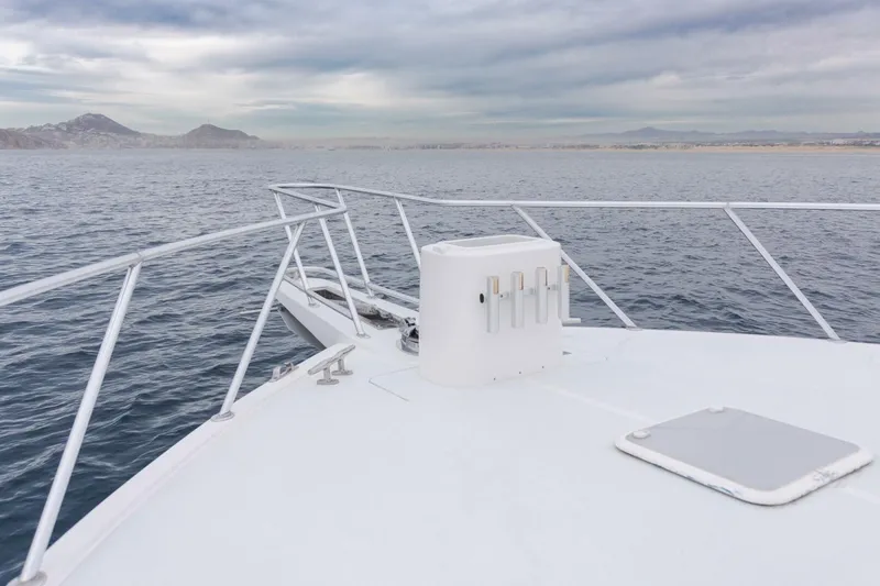 Happy Ending Yacht Photos Pics Bow view of 2000 Viking 55 Convertible yacht on open sea.