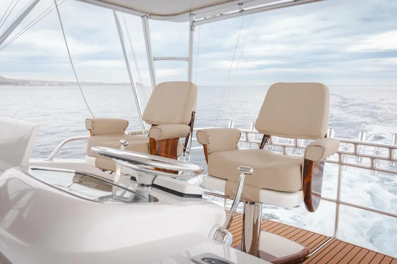 Happy Ending Yacht Photos Pics Luxury seating on a 2000 Viking 55 Convertible yacht, overlooking the ocean.