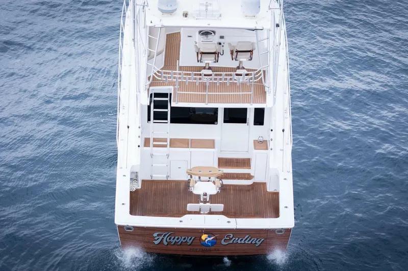 Happy Ending Yacht Photos Pics Aerial view of 2000 Viking 55 Convertible yacht named "Happy Ending" on the water.