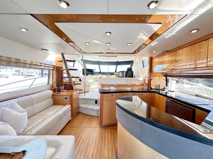 Lai Lani Yacht Photos Pics Luxurious interior of 2005 Sunseeker Manhattan 66 yacht with modern design and elegant furnishings.