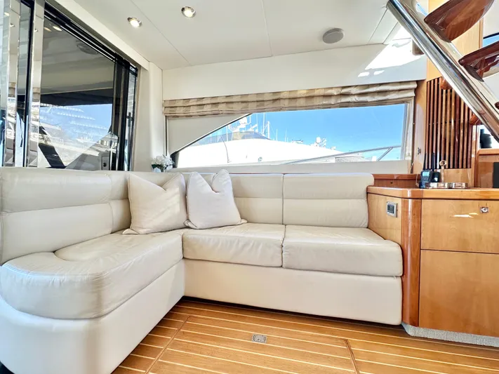 Lai Lani Yacht Photos Pics Luxurious interior of 2005 Sunseeker Manhattan 66 yacht with cream leather seating.