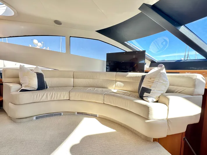 Lai Lani Yacht Photos Pics Luxurious interior of 2005 Sunseeker Manhattan 66 yacht with plush cream seating.