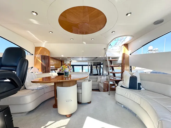 Lai Lani Yacht Photos Pics Luxurious interior of a 2005 Sunseeker Manhattan 66 yacht with elegant seating and decor.