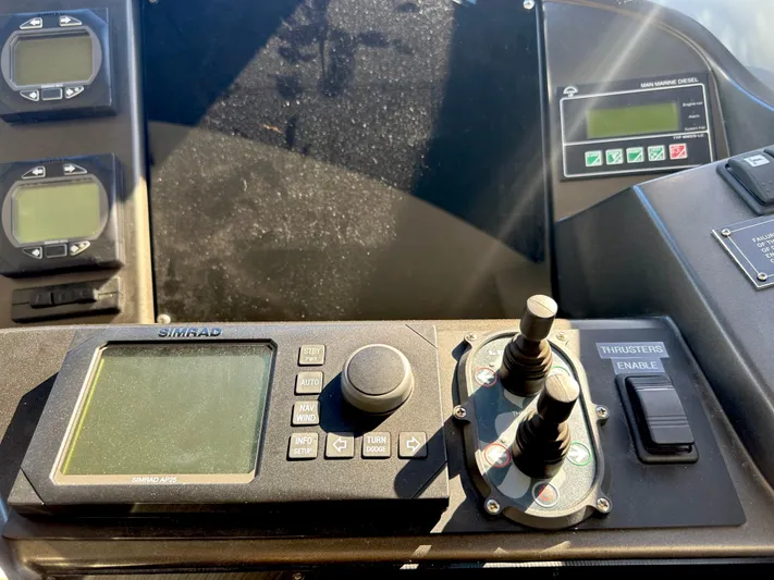 Lai Lani Yacht Photos Pics Control panel of a 2005 Sunseeker Manhattan 66 yacht with navigation equipment.