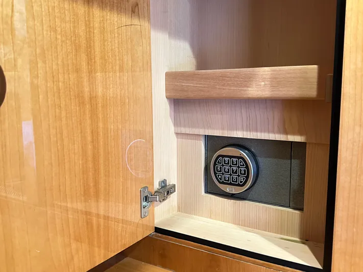 Lai Lani Yacht Photos Pics Safe inside wooden cabinet on 2005 Sunseeker Manhattan 66 yacht.