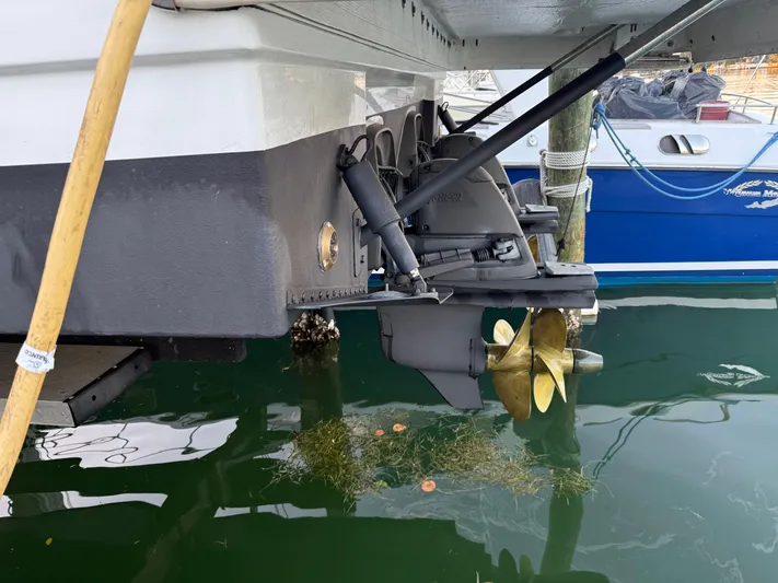  Yacht Photos Pics 2020 Jeanneau NC 37 boat stern with propeller in marina water.