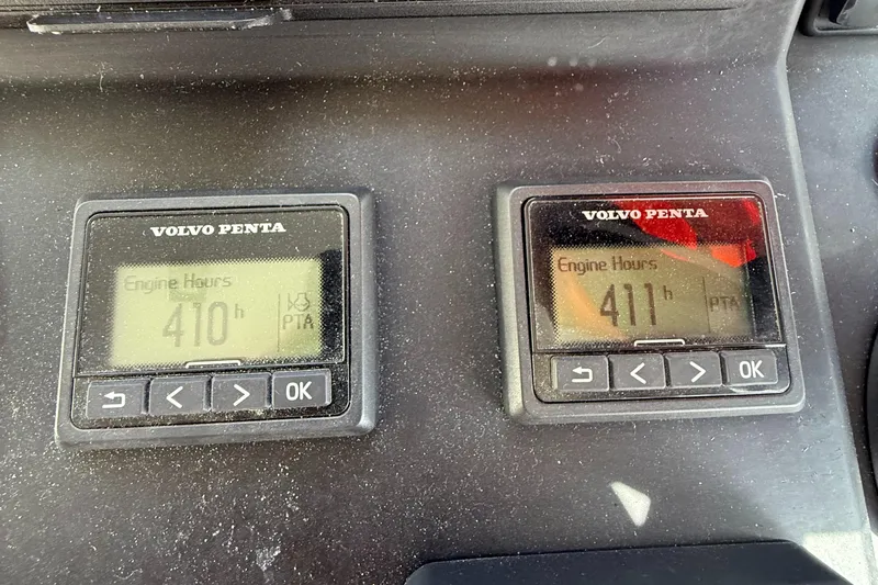  Yacht Photos Pics Volvo Penta engine hour meters showing 410 and 411 hours on Jeanneau NC 37, 2020 model.
