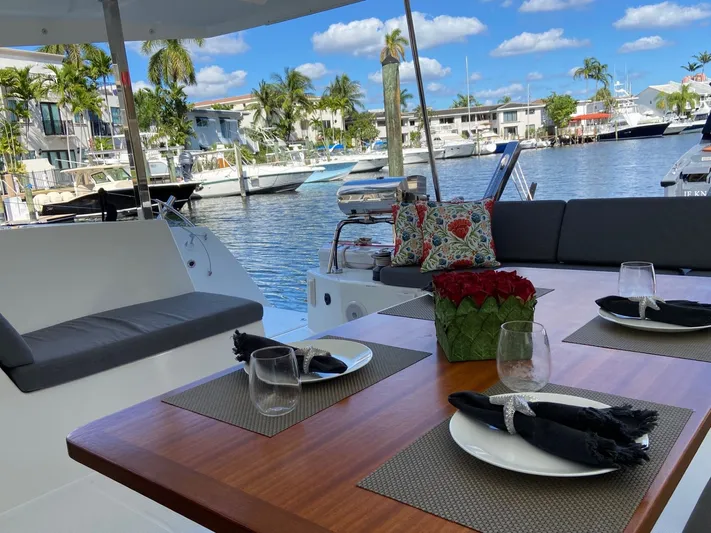 Seas The Day Yacht Photos Pics Luxurious dining area on Fountaine Pajot Isla 40 yacht, 2023.