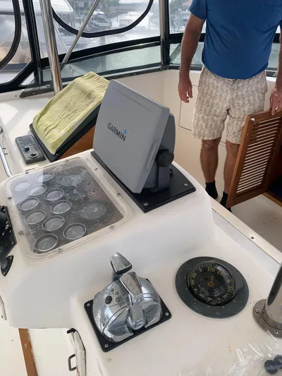 Lolly Yacht Photos Pics Cockpit of 1985 Ocean Yachts 55 Super Sport with Garmin navigation system.