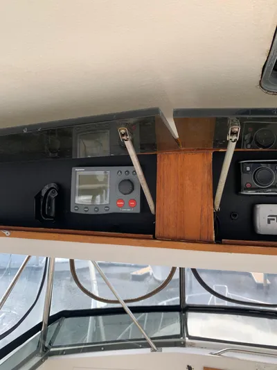 Lolly Yacht Photos Pics Control panel of a 1985 Ocean Yachts 55 Super Sport boat.