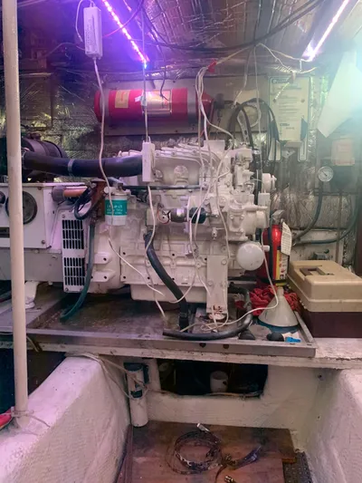 Lolly Yacht Photos Pics Engine room of a 1985 Ocean Yachts 55 Super Sport boat.