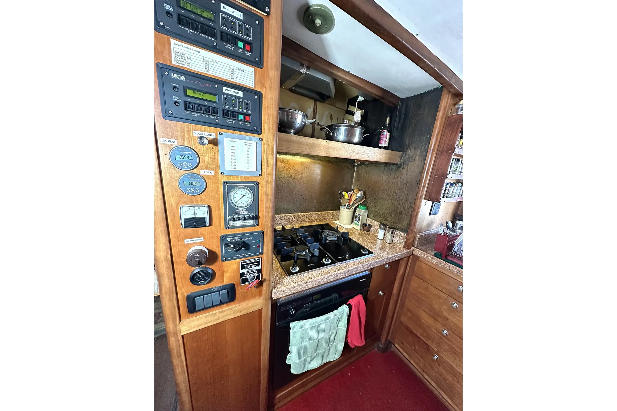 1971 Southern Marine MALAHIDE Pilothouse LRC kitchen with control panel and stove.