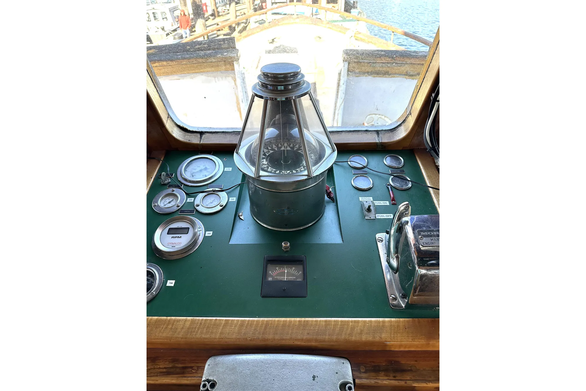 Pilothouse controls of 1971 Southern Marine MALAHIDE Pilothouse LRC, featuring gauges and compass.