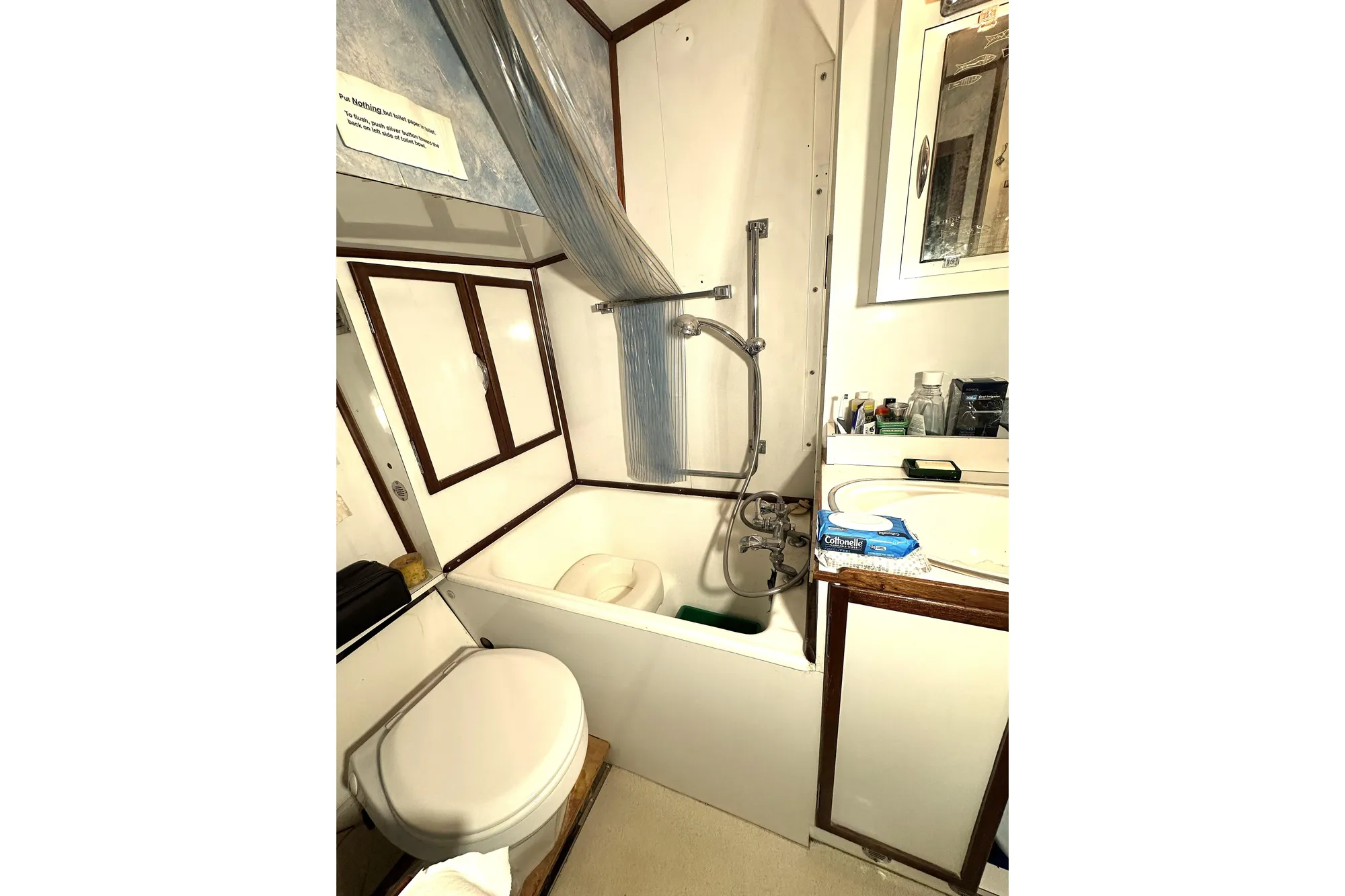 Bathroom interior of 1971 Southern Marine MALAHIDE Pilothouse LRC with shower and toilet.