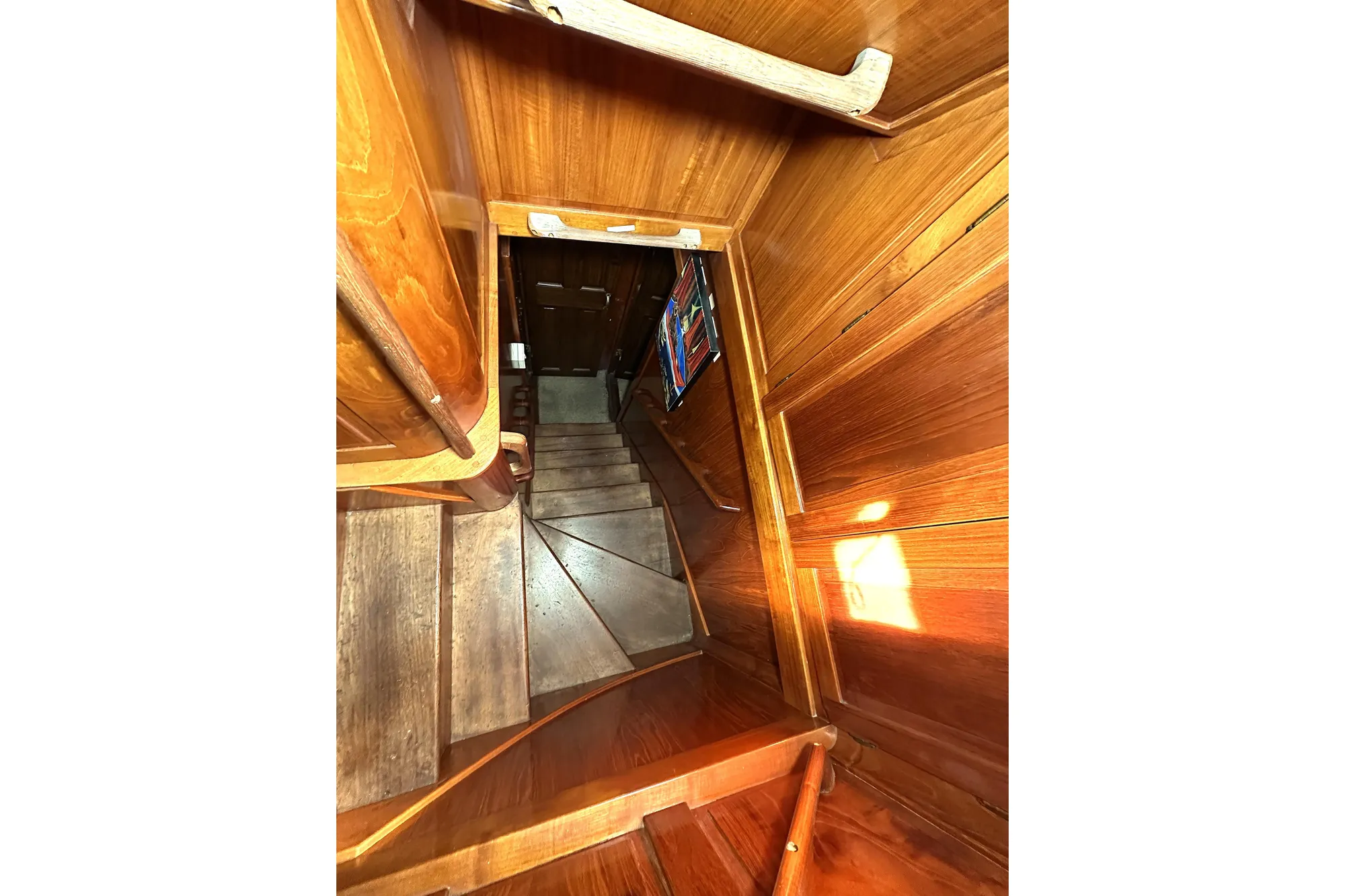 Wooden staircase inside 1971 Southern Marine MALAHIDE Pilothouse LRC yacht.