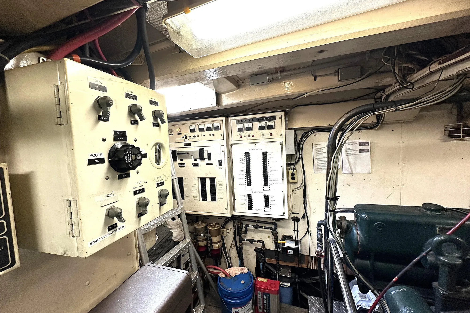 Electrical control panel inside 1971 Southern Marine MALAHIDE Pilothouse LRC, showcasing wiring and switches.