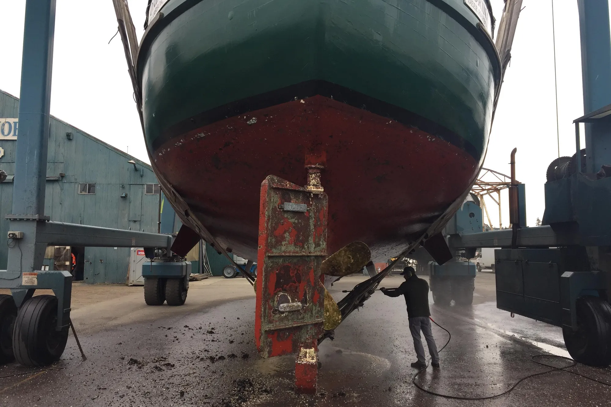 1971 Southern Marine MALAHIDE Pilothouse LRC undergoing maintenance at a shipyard.