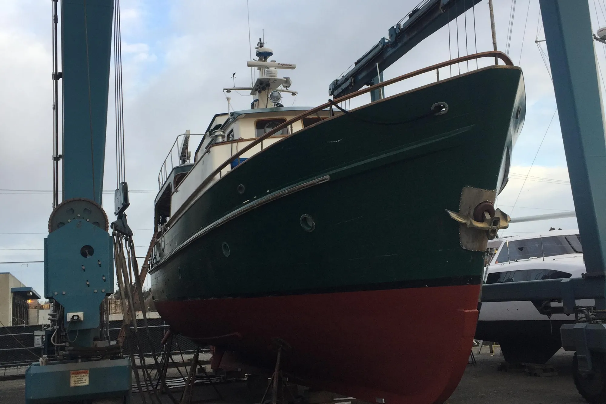 1971 Southern Marine MALAHIDE Pilothouse LRC yacht in dry dock for maintenance.