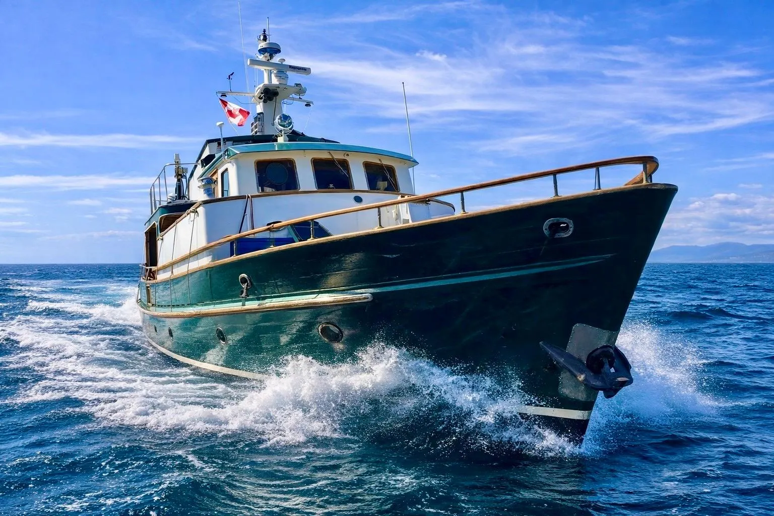 1971 Southern Marine MALAHIDE Pilothouse LRC cruising on open sea under clear blue sky.