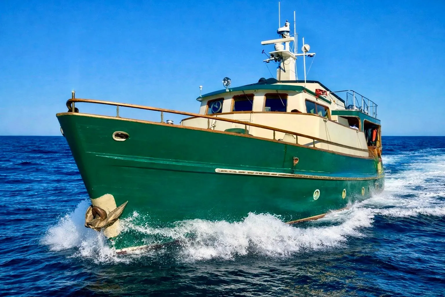 Southern Marine 1971 MALAHIDE Pilothouse LRC cruising on open sea under clear blue sky.