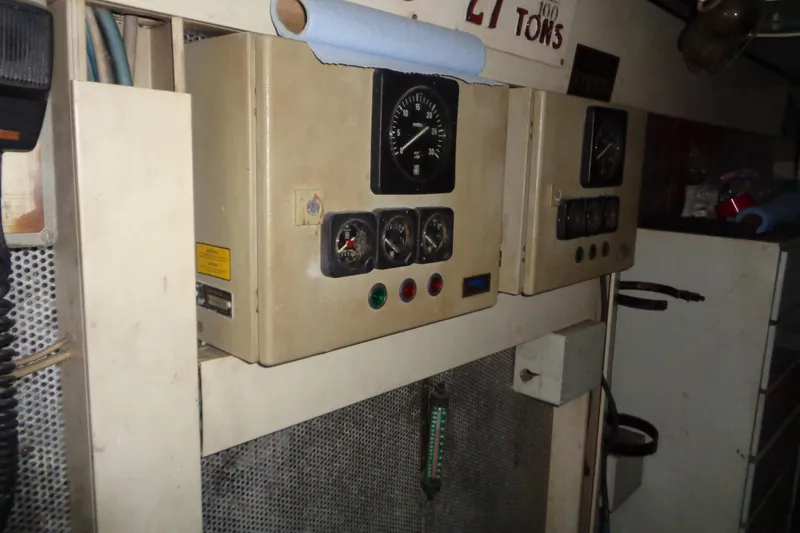 (project Boat) 1995 Azimut 78ultra @ixtapa-mexico Yacht Photos Pics Control panel inside 1995 Azimut 78 Ultra Motoryacht engine room, featuring gauges and switches.