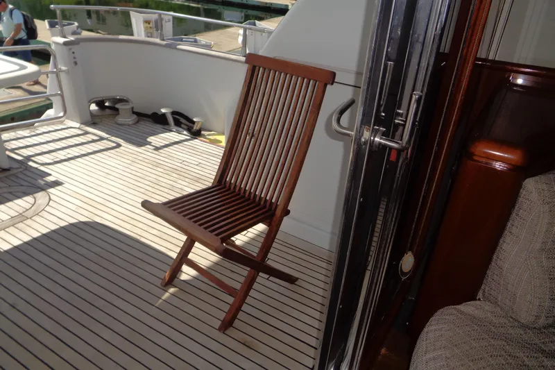 (project Boat) 1995 Azimut 78ultra @ixtapa-mexico Yacht Photos Pics Teak deck with wooden chair on 1995 Azimut 78 Ultra Motoryacht.