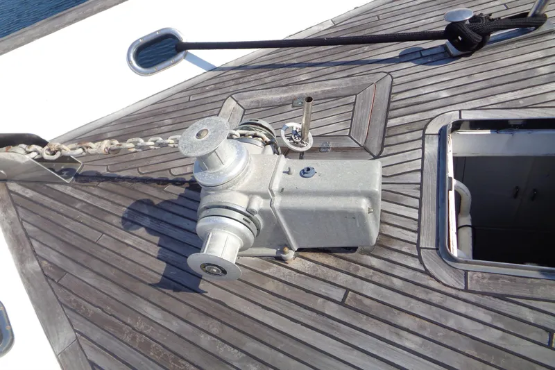 (project Boat) 1995 Azimut 78ultra @ixtapa-mexico Yacht Photos Pics Anchor winch on 1995 Azimut 78 Ultra Motoryacht deck with wooden finish.