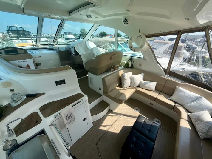  Yacht Photos Pics Luxurious interior of 2009 Cruisers Yachts 420 Coupe with plush seating and modern amenities.