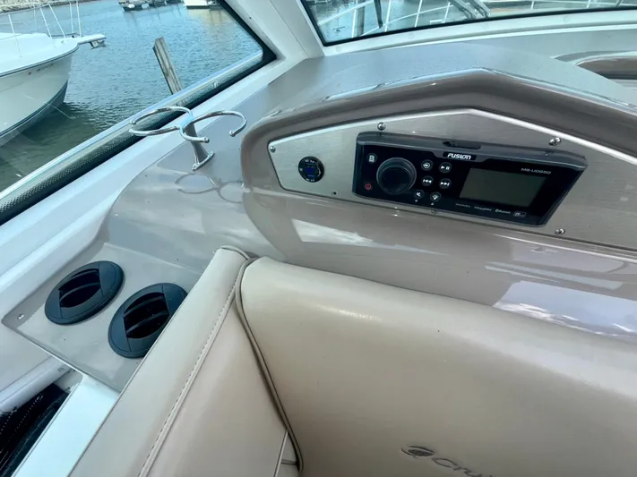  Yacht Photos Pics Interior of 2009 Cruisers Yachts 420 Coupe with Fusion audio system and cup holders.