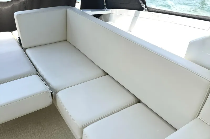  Yacht Photos Pics White leather seating on 2016 Monterey 360 Sport Coupe boat interior.