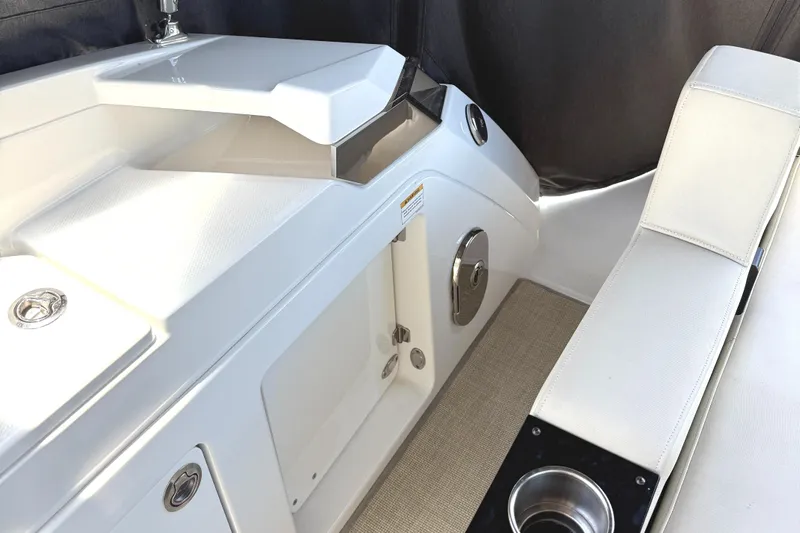  Yacht Photos Pics Interior of 2016 Monterey 360 Sport Coupe, featuring sleek white seating and modern design elements.