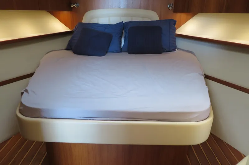 Queen Angela Yacht Photos Pics 2004 Tiara Yachts 3800 Open cabin with cozy bed and pillows.
