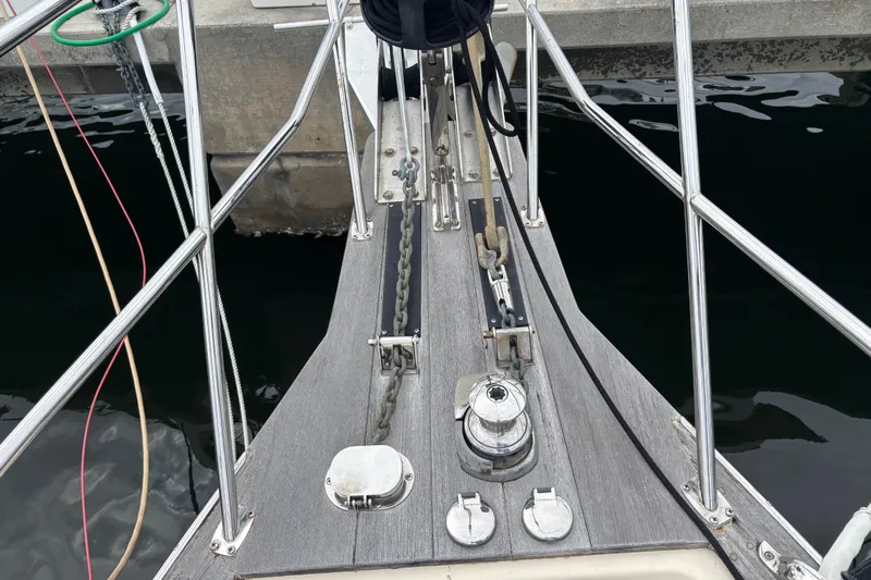 Moondance Yacht Photos Pics Bow of 2007 Island Packet 370 sailboat with anchor chain and winch.