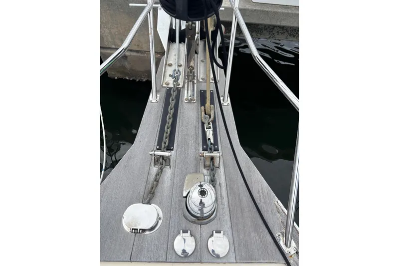 Moondance Yacht Photos Pics Bow of 2007 Island Packet 370 sailboat with anchor chain and winch.