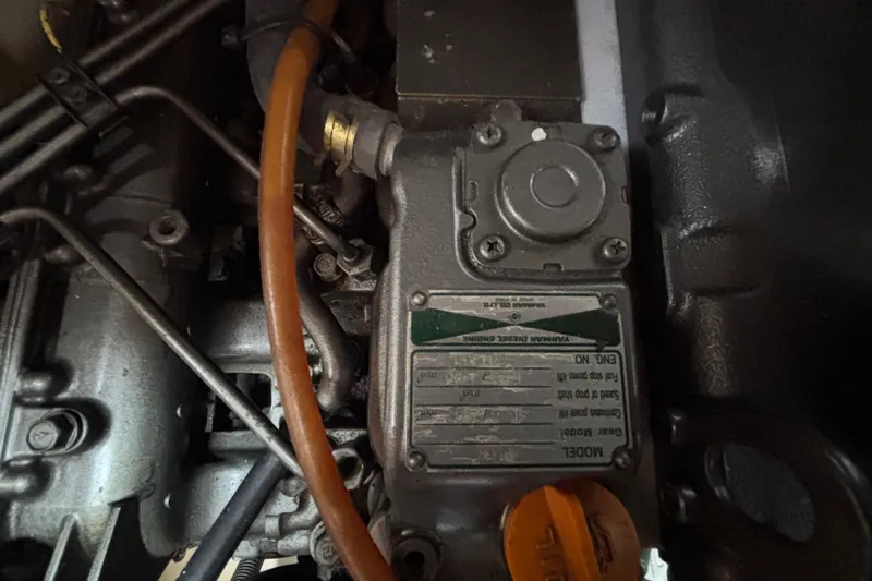 Moondance Yacht Photos Pics Engine compartment of a 2007 Island Packet 370 sailboat, showcasing mechanical components.