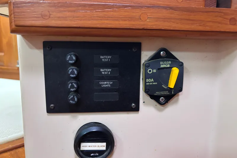 Moondance Yacht Photos Pics Electrical panel on a 2007 Island Packet 370 sailboat with battery and fuse controls.