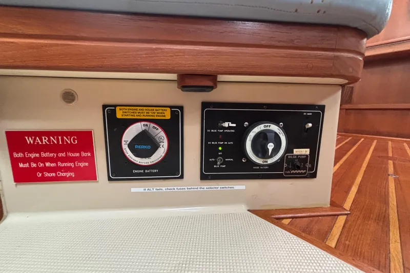 Moondance Yacht Photos Pics 2007 Island Packet 370 control panel with battery and bilge pump switches.