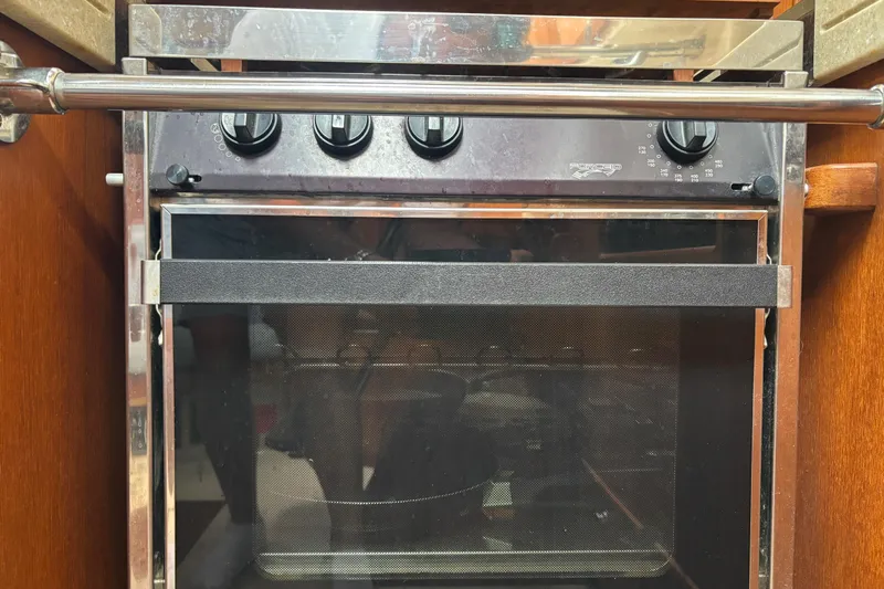 Moondance Yacht Photos Pics Stainless steel oven in 2007 Island Packet 370 yacht kitchen.