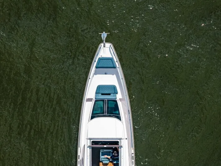  Yacht Photos Pics Overhead view of 2022 Axopar 37 Cross Cabin boat on water.