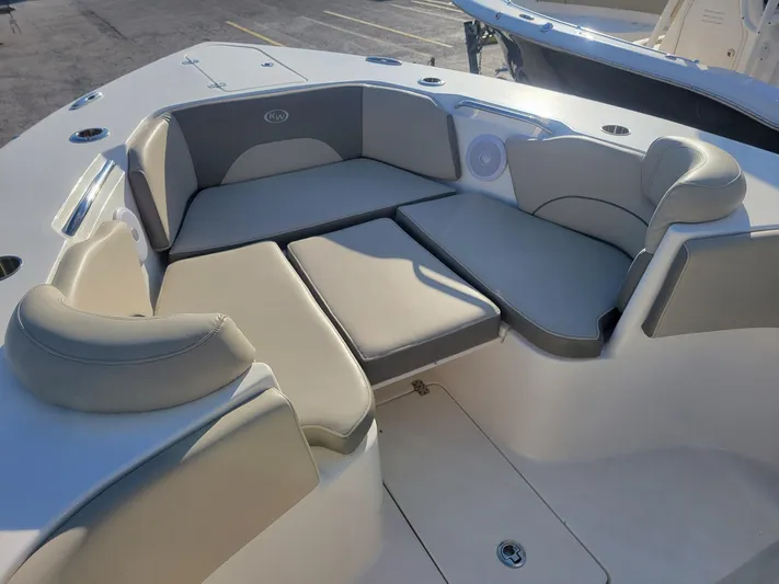 Yacht Photos Pics 2022 Key West 263 FS boat interior with cushioned seating area.