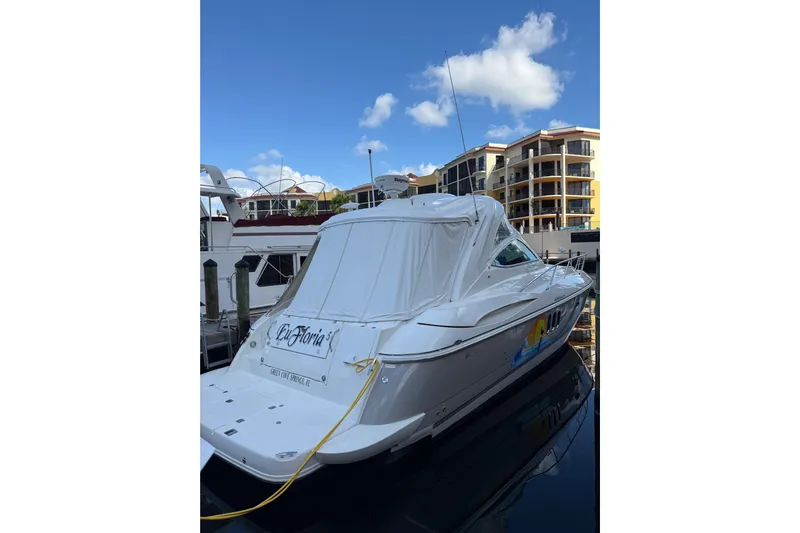  Yacht Photos Pics 2005 Cruisers Yachts 420 Express docked at marina with clear blue sky.