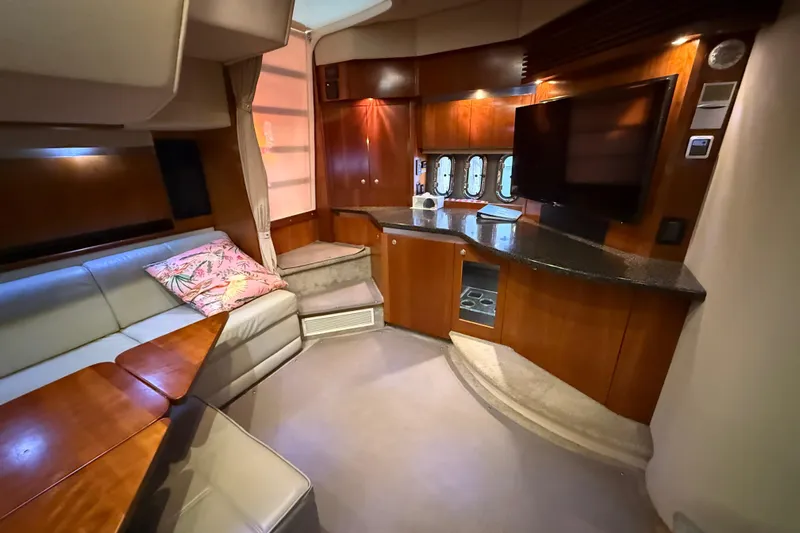  Yacht Photos Pics Luxurious interior of 2005 Cruisers Yachts 420 Express with modern amenities and elegant design.